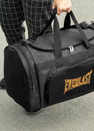 Мужская дорожная сумка everlast orange спортивная черная текстильная на 60л для путешествий2 фото