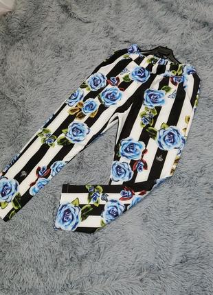 Укороченные летние брюки в полоску с цветами1 фото