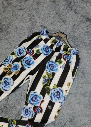 Укороченные летние брюки в полоску с цветами5 фото