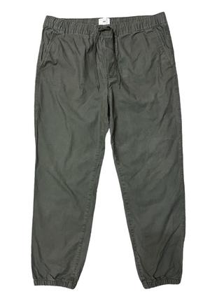 Спортивные штаны из хлопковой ткани regular fit h&m, размер l3 фото