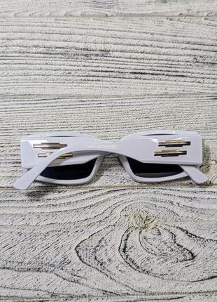 Солнцезащитные очки женские, черные, глянцевые в белой пластиковой оправе (без бренда)7 фото
