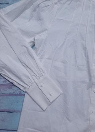 Красивая белая блуза свободного кроя с рукавами объемными4 фото