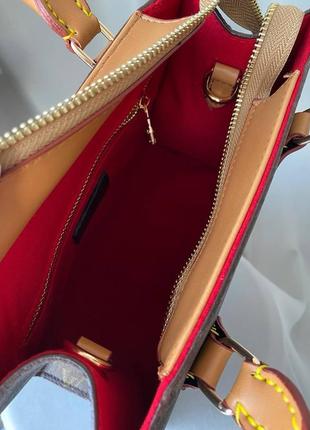 Женская сумка формата а4 louis vuitton с ремешком на плече трендов модель луи виттон6 фото