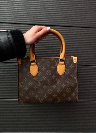 Женская сумка формата а4 louis vuitton с ремешком на плече трендов модель луи виттон4 фото