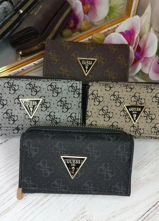 Кошельки и сумочки guess по доступным ценам.