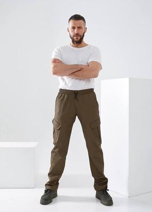 Чоловічі тактичні штани накладні кишені з клапаном понизу фіксатор3 фото