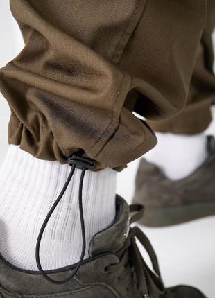 Чоловічі тактичні штани накладні кишені з клапаном понизу фіксатор4 фото