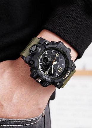 Мужские спортивные наручные часы skmei 1155 электронные с подсветкой, армейские камуфляжные часы с будильником4 фото