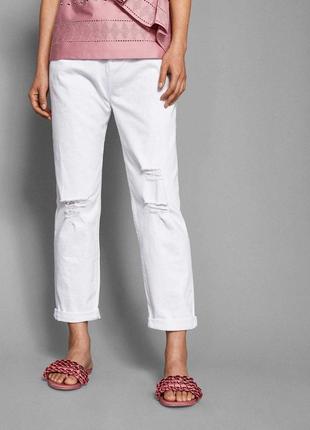 Стильні високі джинси мом