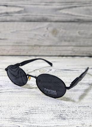 Сонцезахисні окуляри овальні, унісекс, поляризація, чорні в золотистій металевій оправі (без бренда)