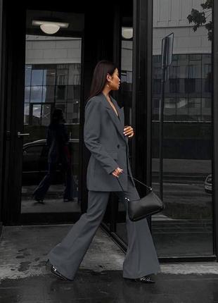 Жіночий модний діловий костюм піджак і брюки широкі вільного крою кльош стильний класичний комплект оверсайз2 фото