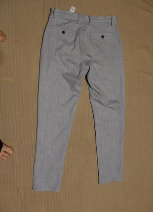 Красивые узкие смесовые брюки светло-серого меланжевого цвета  zara man испания 30 р.9 фото