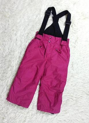 Яркие розовые лыжные зимние термо штаны девочке.