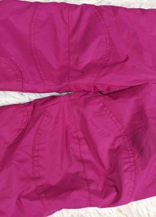Яркие розовые лыжные зимние термо штаны девочке.2 фото