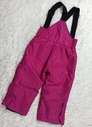 Яркие розовые лыжные зимние термо штаны девочке.4 фото