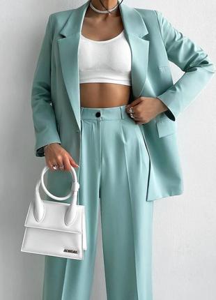 Очень стильный женский классический брючный костюм с брюками палаццо и пиджаком4 фото