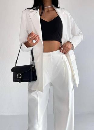 Костюм женский однотонный классический оверсайз пиджак на пуговице брюки свободного кроя на высокой посадке качественный базовый белый2 фото