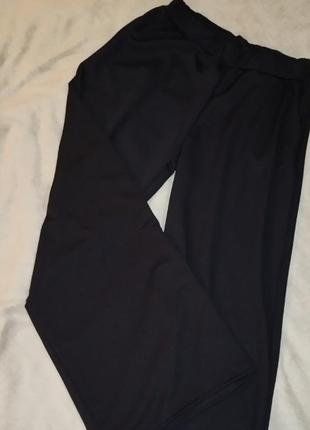 Женские черные брюки палаццо рубчик с карманами 42-521 фото