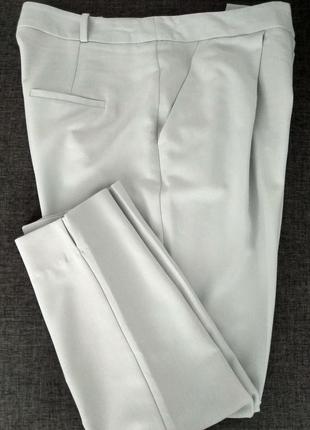 Topshop. повседневные брюки с карманами зауженные к низу.3 фото