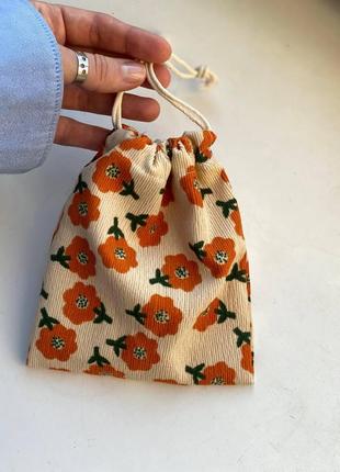Органайзер для прикрас, резинок, заколок з тканини в оранжеву квіточку1 фото