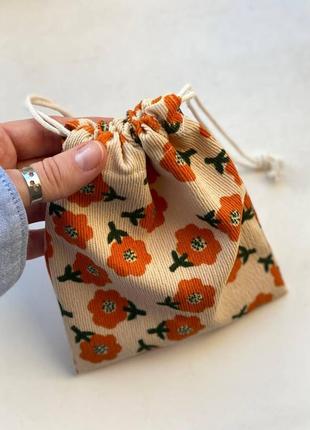 Органайзер для прикрас, резинок, заколок з тканини в оранжеву квіточку2 фото