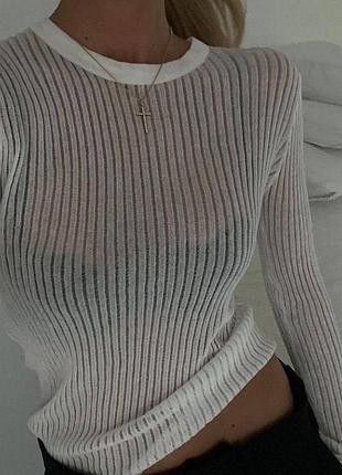 Трендовый полупрозрачный топ с длинными рукавами.