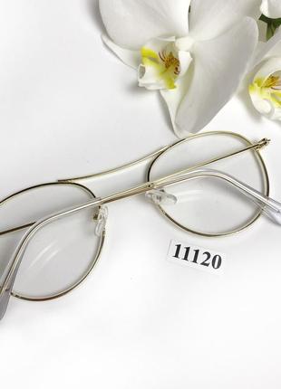 Имиджевые очки в золотистой оправе4 фото