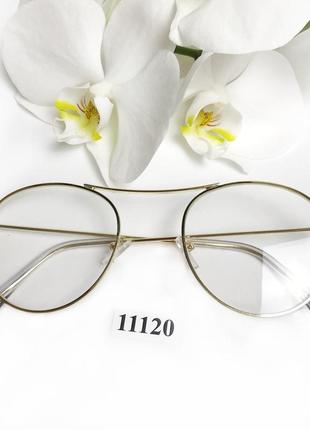 Имиджевые очки в золотистой оправе3 фото