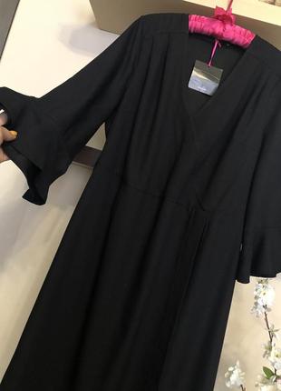 Суворе, класичне і елегантне чорне плаття на запах,4 фото