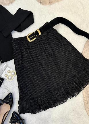 Черная юбка мини с воланом блестящая1 фото