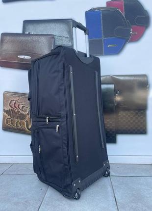 Дуже велика сумка на колесах fly 6086 (or)2 фото
