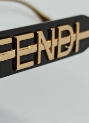 Очки в стиле fendi женские солнцезащитные маска черные безоправные с золотым логотипом10 фото