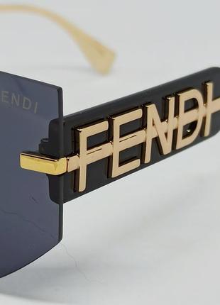 Очки в стиле fendi женские солнцезащитные маска черные безоправные с золотым логотипом3 фото