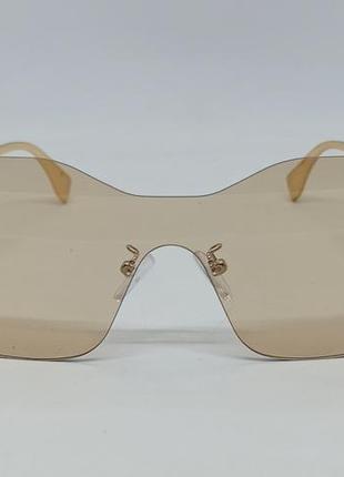 Очки в стиле fendi маска женские солнцезащитные безоправные бежевые с золотым логотипом2 фото