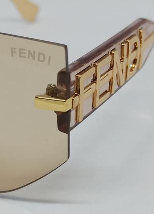 Очки в стиле fendi маска женские солнцезащитные безоправные бежевые с золотым логотипом3 фото