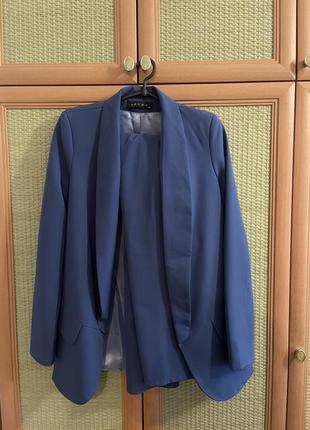 Костюм ( пиджак + брюки) синего цвета1 фото