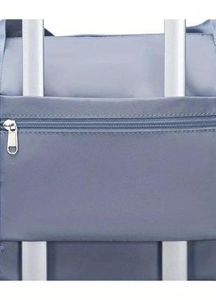 Дорожня сумка для подорожей для ручної поклажі на колесах сіра4 фото