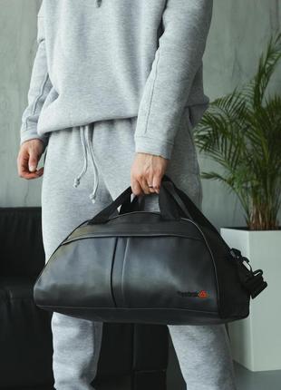 Сумка груша кожзам reebok черная, черное лого,сумка дорожная,спортивная сумка,сумка для поездок