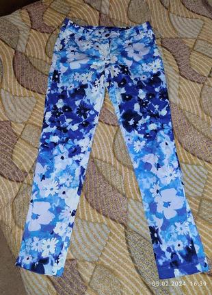 Яскраві штани із синіми квітами orsay2 фото