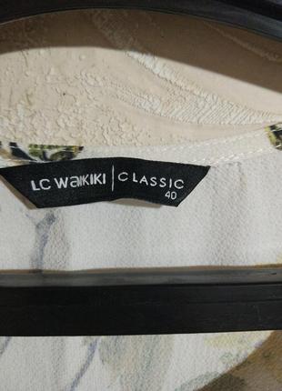 Блуза lc waikiki из фактурной ткани с воланами6 фото
