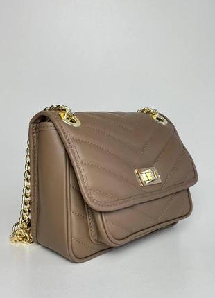 Кожаная женская сумка кросс-боди на плечо стеганая итальянская vezze.3 фото