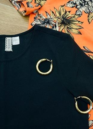 Черная блуза с закруглённой окантовкой h&m2 фото