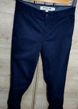 Чоловічі завужені елегантні штани чиноси lacoste колір синій розмір 34/342 фото