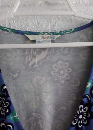 Легкая летняя блузка с запахом в цветочный принт4 фото