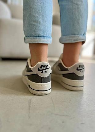 Найк аір кеди сірі з білим nike air3 фото