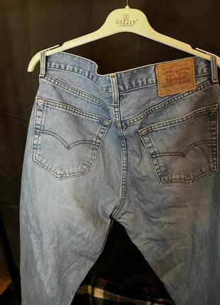 Голубые джинсы levi’s 5215 фото