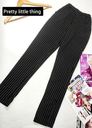Женские брюки леггинсы черного цвета с высокой посадкой в полоску от бренда pretty little thing xs