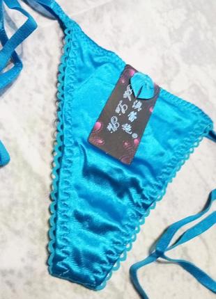 Трусики жіночі атласні на зв'язках.