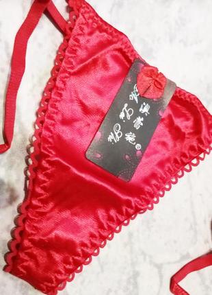 Трусики жіночі атласні на зв'язках.