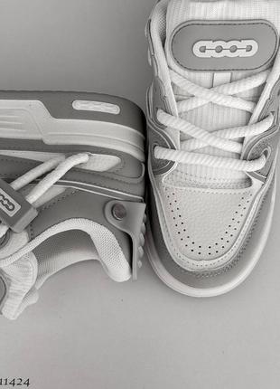 Стильні та зручні кросівки
☑ колір: сірий+білий, екошкіра/текстиль6 фото